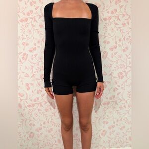 Are You Am I Anke Romper Black | Long Sleeve Ribbed Open Neck Catsuit